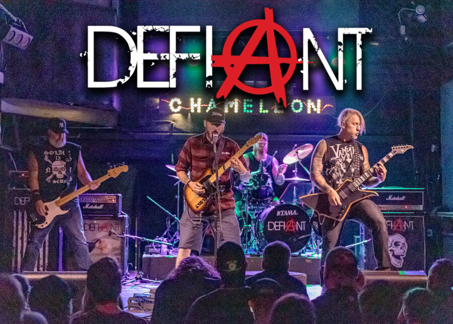 Left to Right - Paul Barlowski (bass), Albert "Big Al" Halterman (guitar/lead vocals), Paul "PMCF" Cochran (drums), Joe Defiant (lead guitar)